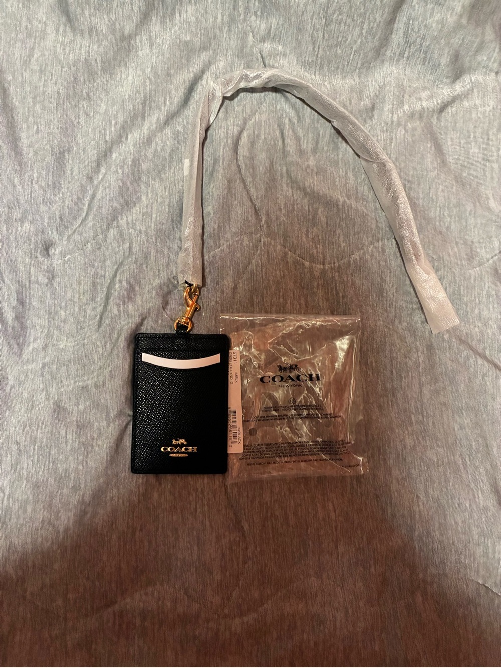 Coach Black Leather Card Holder with Gold Hardware and White Accent